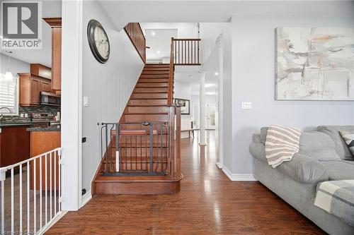 Rich wood-finish flooring throughout - 79 Garinger Crescent, Hamilton, ON - Indoor Photo Showing Other Room