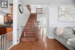 Rich wood-finish flooring throughout - 