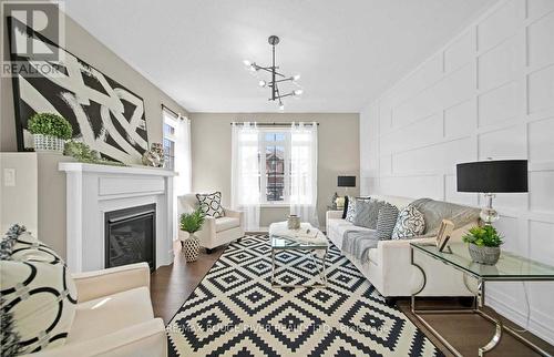 27 Crombie Street, Clarington (Bowmanville), ON - Indoor Photo Showing Other Room With Fireplace