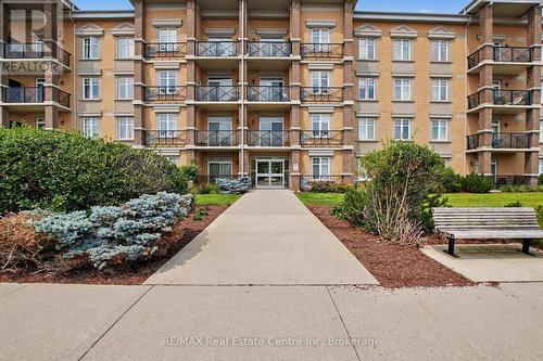 410 - 2 Colonial Drive, Guelph (Pineridge/Westminster Woods), ON - Outdoor With Balcony With Facade