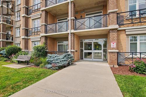 410 - 2 Colonial Drive, Guelph (Pineridge/Westminster Woods), ON - Outdoor With Balcony With Facade