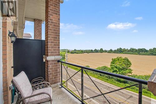 410 - 2 Colonial Drive, Guelph (Pineridge/Westminster Woods), ON - Outdoor With Balcony