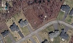 Undeveloped lot to right is a future City Park - 