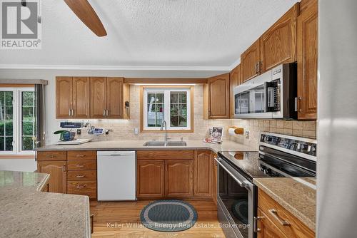 52 Rowlands Lane, Prince Edward County (Sophiasburg Ward), ON - Indoor Photo Showing Kitchen With Double Sink
