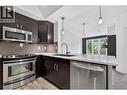 Modern, Renovated Kitchen With Sleek Finishes and Updated Appliances - 7343 Okanagan Landing Road Unit# 2402, Vernon, BC  - Indoor Photo Showing Kitchen With Upgraded Kitchen 