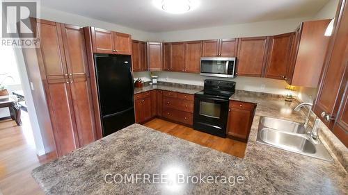 1680 Timmins Avenue, Innisfil (Alcona), ON - Indoor Photo Showing Kitchen With Double Sink