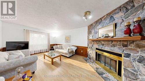 2590 Ambercroft Trail, Mississauga, ON - Indoor Photo Showing Living Room With Fireplace