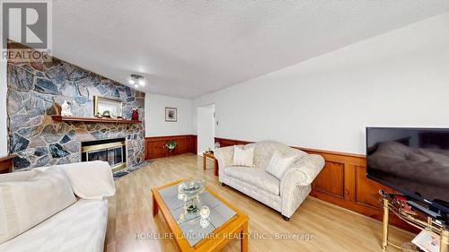 2590 Ambercroft Trail, Mississauga, ON - Indoor Photo Showing Living Room With Fireplace