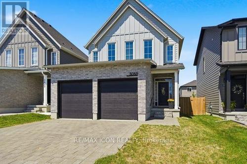 Durable Hardie siding and insulated garage doors - 3053 Heardcreek Trail, London North (North S), ON - Outdoor With Facade