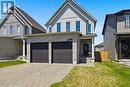 Durable Hardie siding and insulated garage doors - 3053 Heardcreek Trail, London North (North S), ON  - Outdoor With Facade 