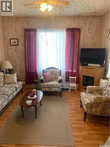 830 Main Street, Holdfast, SK - Indoor Photo Showing Living Room With Fireplace