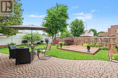 Beautifully Landscaped Backyard - 329 Pintail Terrace, Ottawa, ON - Outdoor With Deck Patio Veranda With Backyard