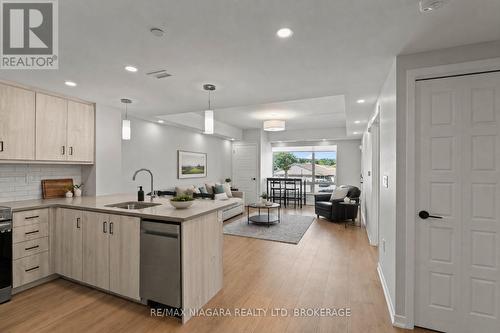 Virtually Staged - 206 - 3998 Victoria Avenue, Lincoln (Lincoln-Jordan/Vineland), ON - Indoor Photo Showing Kitchen With Upgraded Kitchen