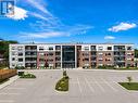 206 - 3998 Victoria Avenue, Lincoln (Lincoln-Jordan/Vineland), ON  - Outdoor With Balcony With Facade 