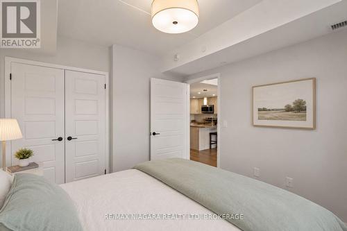 Virtually Staged - 206 - 3998 Victoria Avenue, Lincoln (Lincoln-Jordan/Vineland), ON - Indoor Photo Showing Bedroom