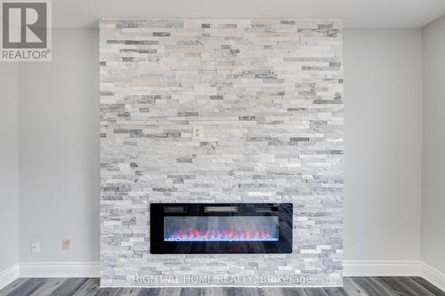 34 Meadowlark Drive, Brampton, ON - Indoor Photo Showing Living Room With Fireplace