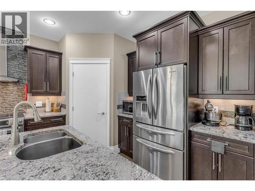 4157 Gallaghers Fairway S, Kelowna, BC - Indoor Photo Showing Kitchen With Double Sink With Upgraded Kitchen