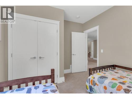 4157 Gallaghers Fairway S, Kelowna, BC - Indoor Photo Showing Bedroom
