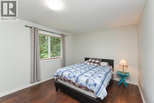 6601 Mystery Beach Rd, Fanny Bay, BC - Indoor Photo Showing Bedroom