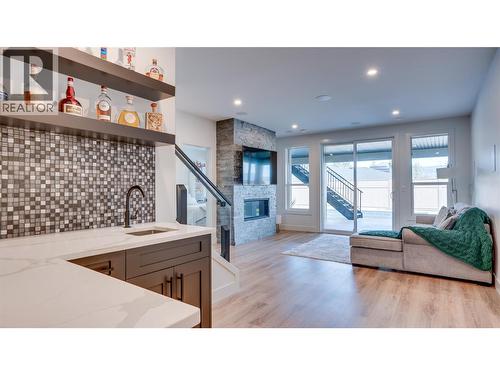 2698 Koyama Road, Lake Country, BC - Indoor Photo Showing Living Room With Fireplace
