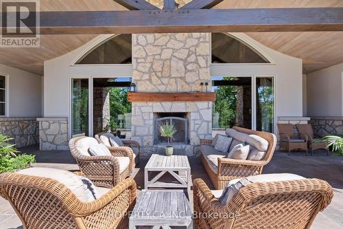 10955 Old River Road, Middlesex Centre, ON - Outdoor With Fireplace With Exterior