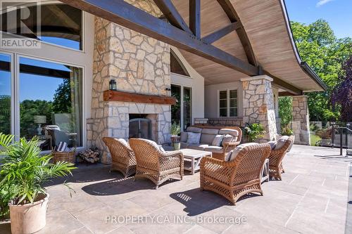 10955 Old River Road, Middlesex Centre, ON - Outdoor With Fireplace With Exterior