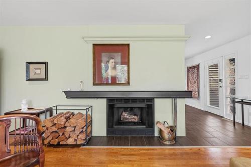 1324 Wellington Cr, Winnipeg, MB - Indoor Photo Showing Living Room With Fireplace