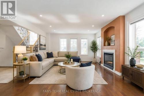 Virtually staged - 2 Vanessa Drive, Orillia, ON - Indoor Photo Showing Living Room With Fireplace