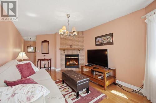 8 Pressed Brick Drive, Brampton, ON - Indoor Photo Showing Living Room With Fireplace