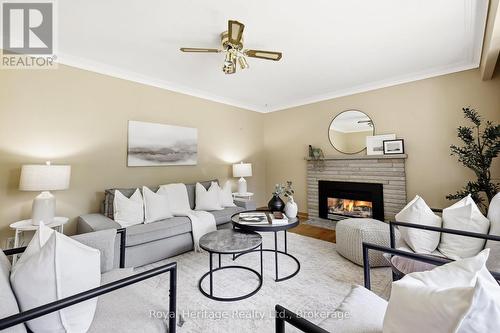 12 Simcoe Street, Whitby (Brooklin), ON - Indoor Photo Showing Living Room With Fireplace