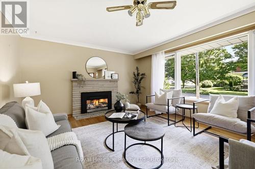 12 Simcoe Street, Whitby (Brooklin), ON - Indoor Photo Showing Living Room With Fireplace