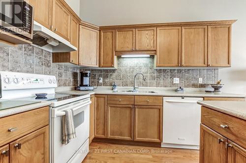 47 - 1077 Hamilton Road, London East (East O), ON - Indoor Photo Showing Kitchen With Double Sink