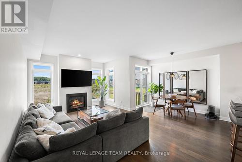 Living room & Dining Area - 800 Solarium Avenue, Ottawa, ON - Indoor Photo Showing Living Room With Fireplace