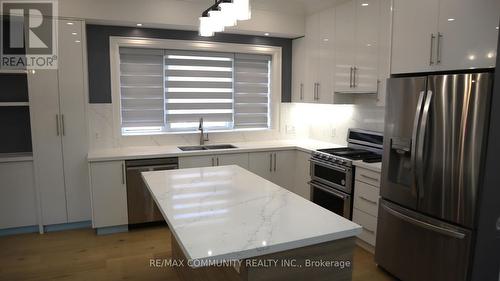7 Denham Road, Toronto, ON - Indoor Photo Showing Kitchen With Stainless Steel Kitchen With Double Sink With Upgraded Kitchen