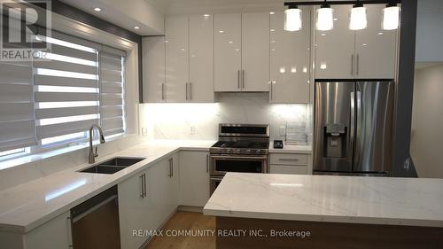 7 Denham Road, Toronto, ON - Indoor Photo Showing Kitchen With Stainless Steel Kitchen With Double Sink With Upgraded Kitchen