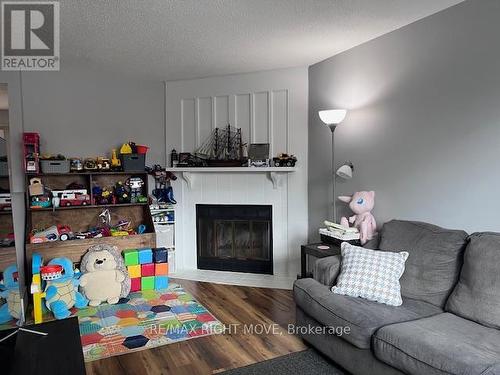 3 - 486 Springbank Avenue N, Woodstock, ON - Indoor Photo Showing Living Room With Fireplace