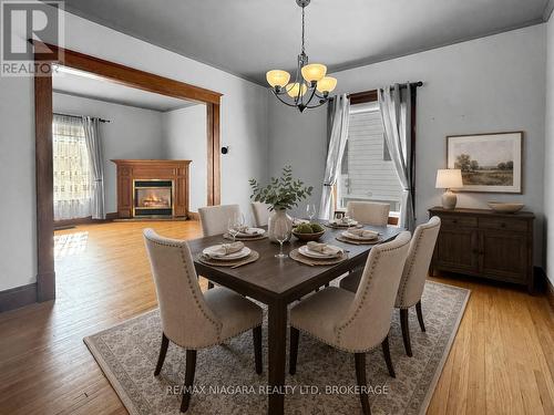 18 Emerick Avenue, Fort Erie (Central), ON - Indoor Photo Showing Dining Room With Fireplace