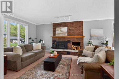 83 Blackburn Crescent, Middlesex Centre (Kilworth), ON - Indoor Photo Showing Living Room With Fireplace