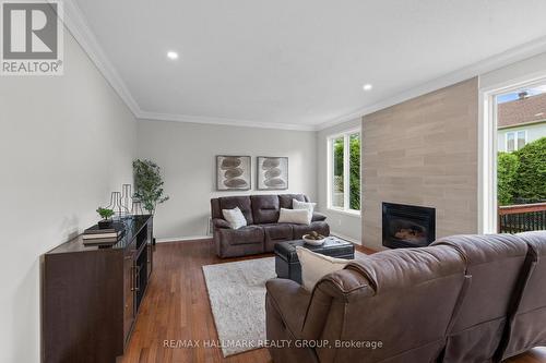 2104 Sandy Oaks Drive, Ottawa, ON - Indoor Photo Showing Living Room With Fireplace