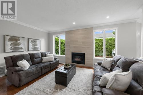 2104 Sandy Oaks Drive, Ottawa, ON - Indoor Photo Showing Living Room With Fireplace