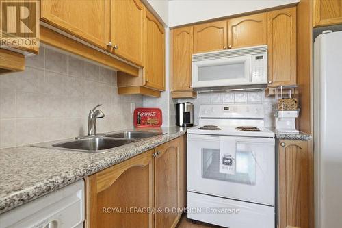 828 - 80 Harrison Garden Boulevard, Toronto, ON - Indoor Photo Showing Kitchen With Double Sink