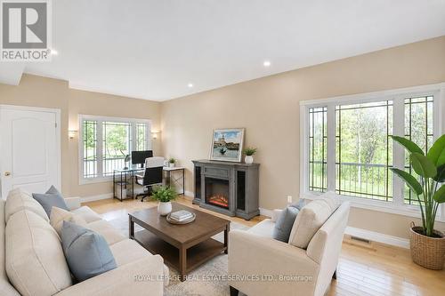 960 Lawson Road, Tiny, ON - Indoor Photo Showing Living Room With Fireplace