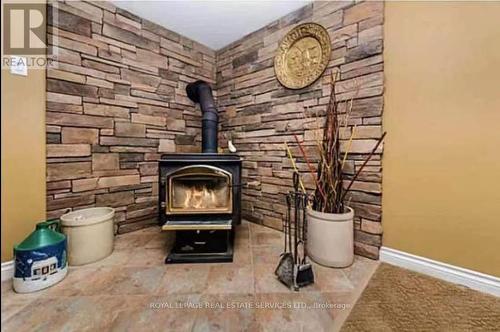 960 Lawson Road, Tiny, ON - Indoor Photo Showing Other Room With Fireplace