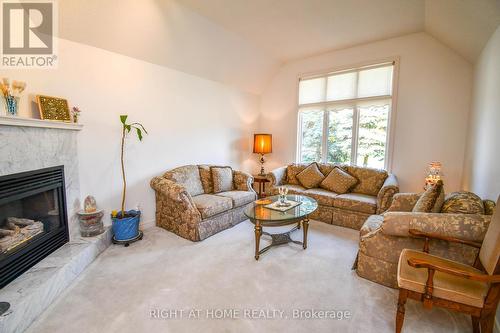 11 Thackeray Crescent, Barrie, ON - Indoor Photo Showing Living Room With Fireplace
