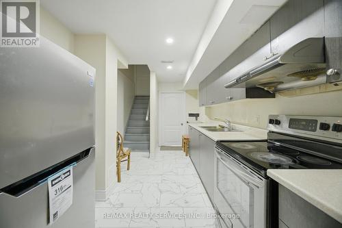 18 Seedland Crescent, Brampton, ON - Indoor Photo Showing Kitchen With Double Sink