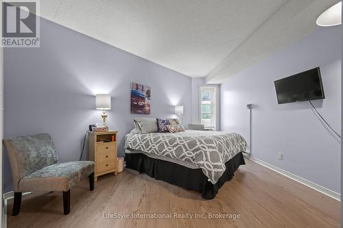 Guest suite $25/night with bedroom, TV & ensuite - 306 - 208 Silvercreek Parkway N, Guelph (Junction/Onward Willow), ON - Indoor Photo Showing Bedroom