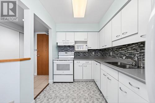 306 - 208 Silvercreek Parkway N, Guelph (Junction/Onward Willow), ON - Indoor Photo Showing Kitchen With Double Sink