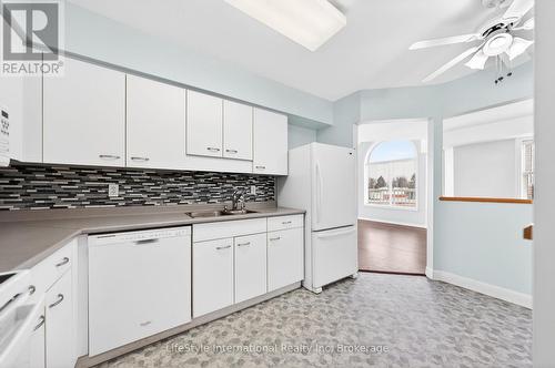 306 - 208 Silvercreek Parkway N, Guelph (Junction/Onward Willow), ON - Indoor Photo Showing Kitchen With Double Sink