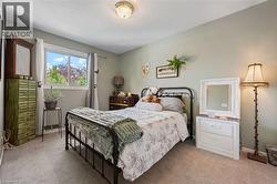 Wall-to-wall carpeting and neutral wall tones define this interior space - 