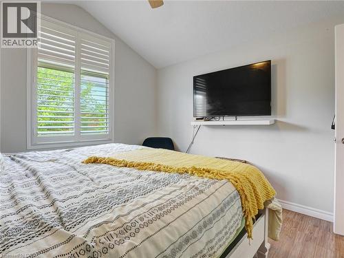 Room featuring a vaulted ceiling and wood-finish flooring - 209 Briarmeadow Drive, Kitchener, ON - Indoor Photo Showing Bedroom